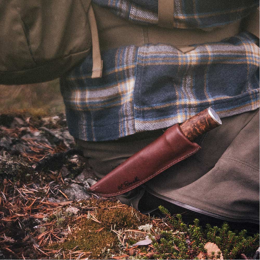 Sheath, dark tanned leather with metal spring, different models